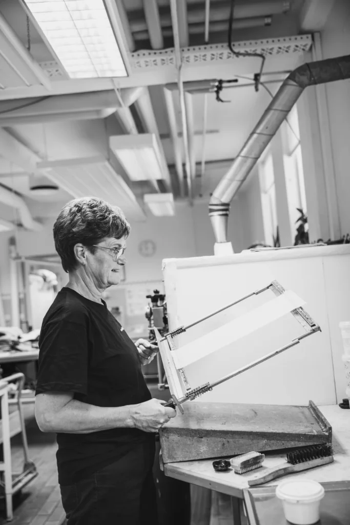 Black and white photo of Karin working in the Almedahls lab