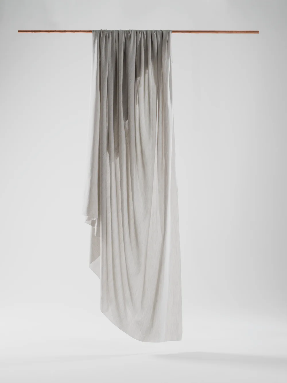 Earth is a sophisticated textile that has a mélange effect