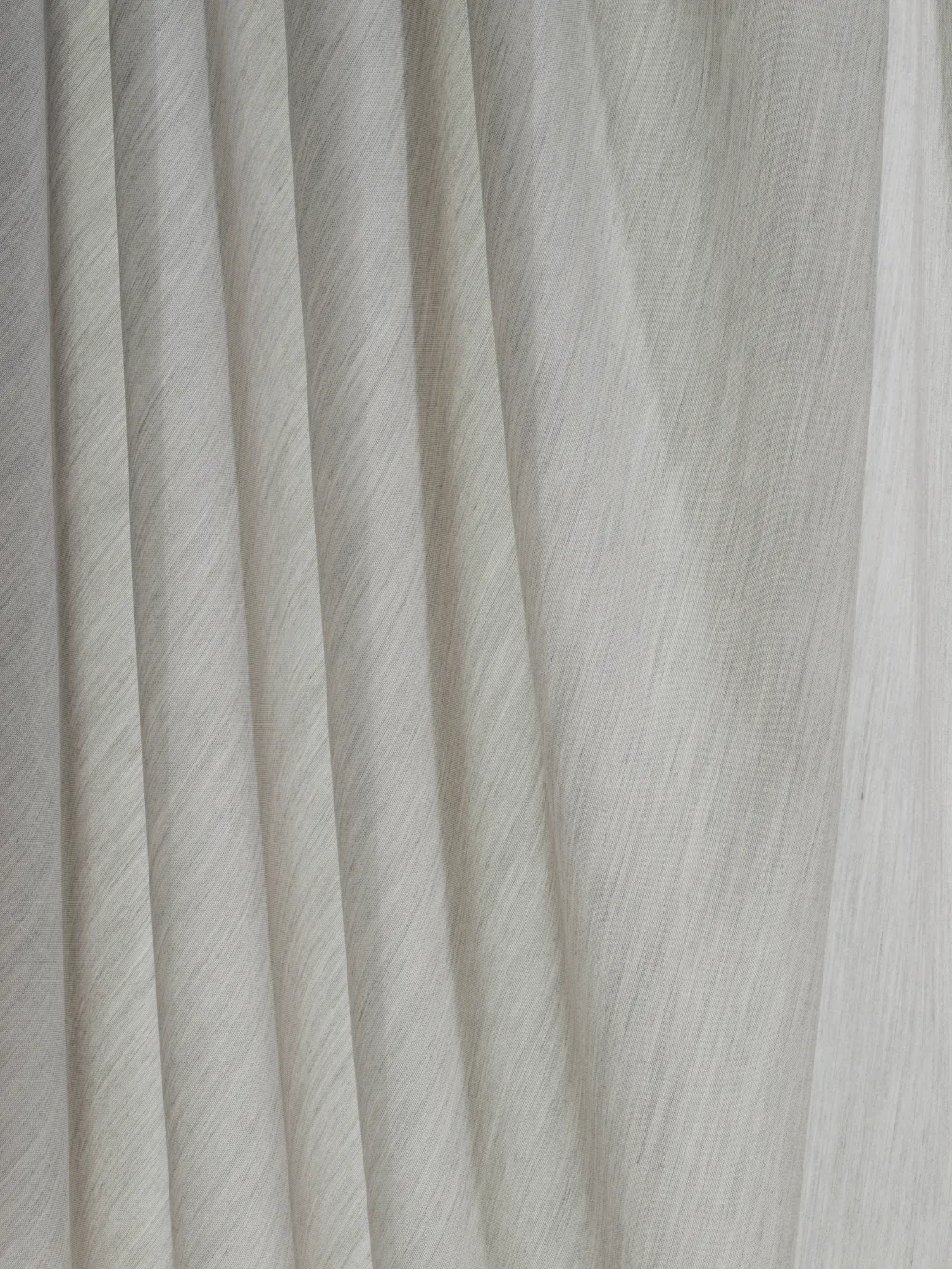 Earth is a sophisticated textile that has a mélange effect