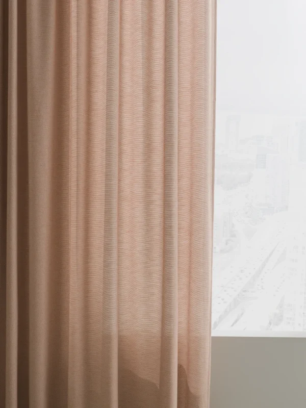 Tilt a sheer curtain fabric.
