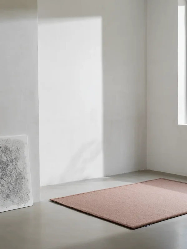 Frame concept rug in deep brown colour