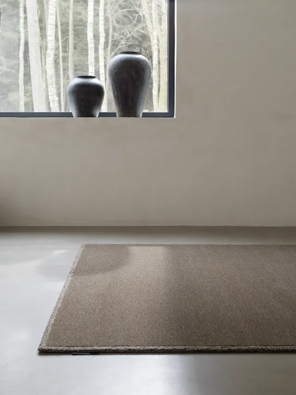 Frame concept rug in environment. Creative rugs