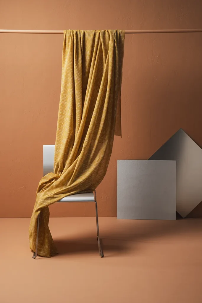 Deep yellow curtain fabric with solver details