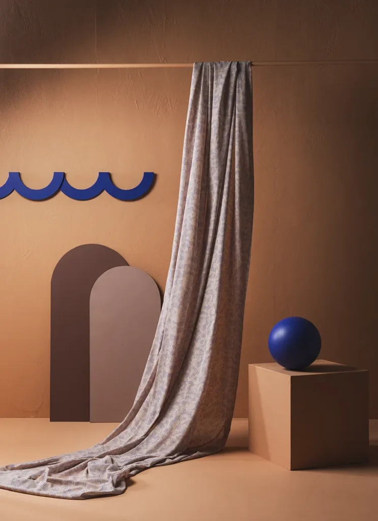 Deep curtain fabric with blue dots