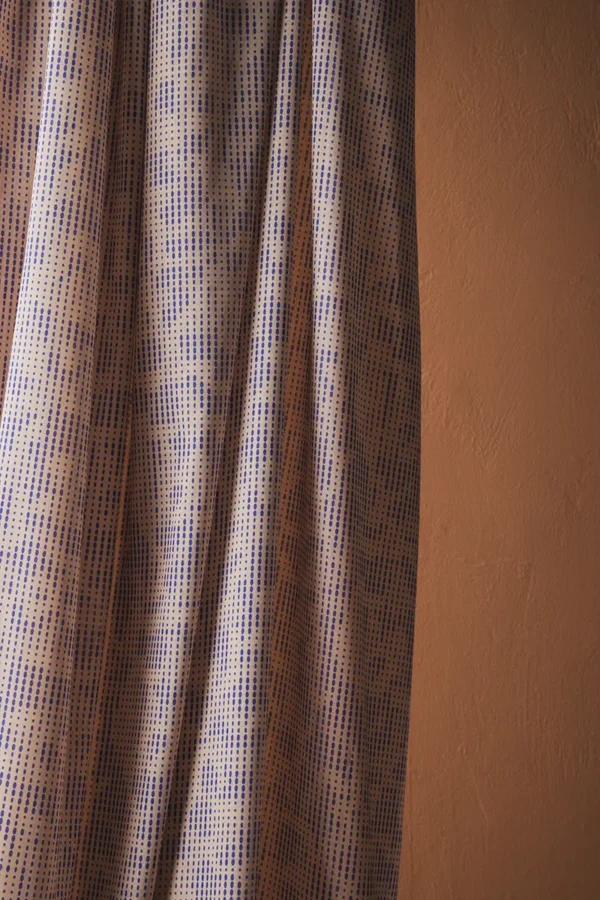 Deep textile curtain fabric with blue dots