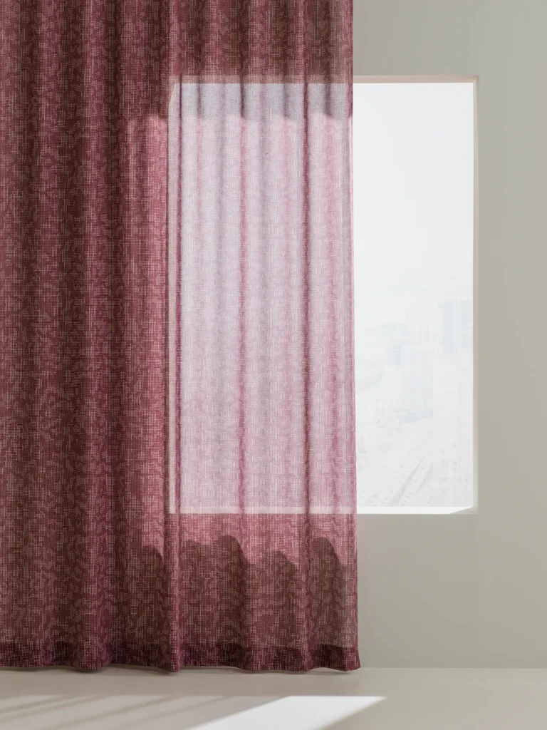 Deep in burgundy in window