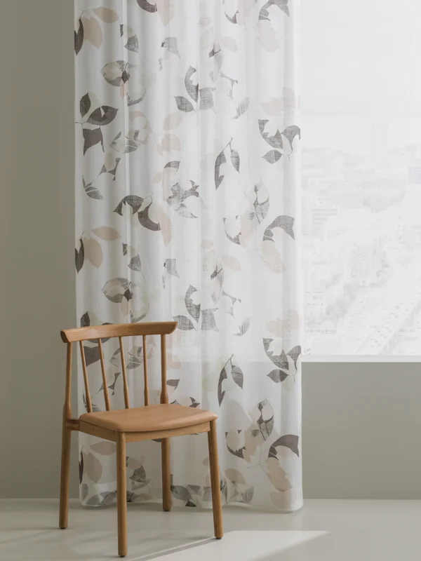 Morris Almedahls curtain fabric with a design chair