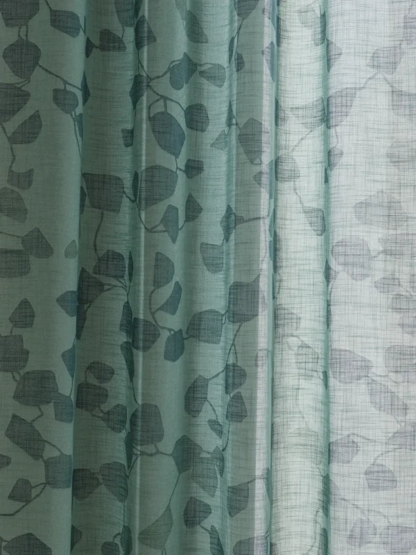 Rango curtain fabric with a subtil pattern.