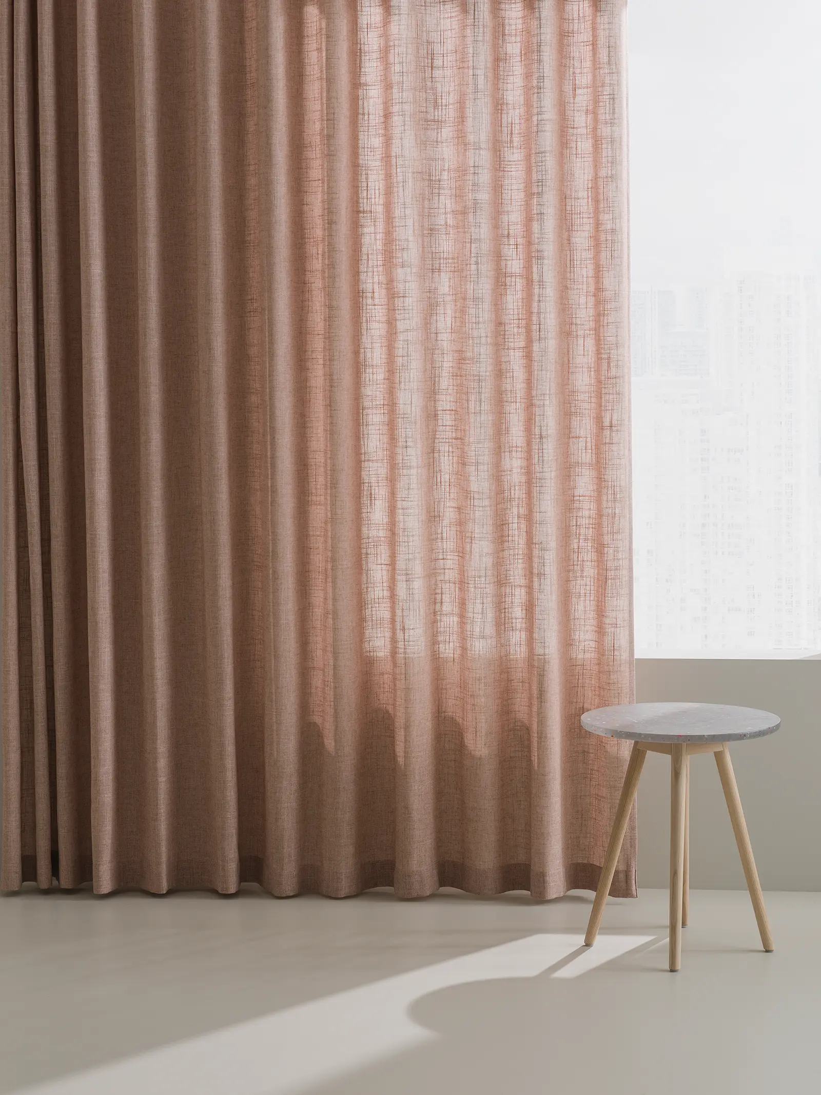 Rye 101602 4 Almedahls Rye curtain fabric with a chair in the front.