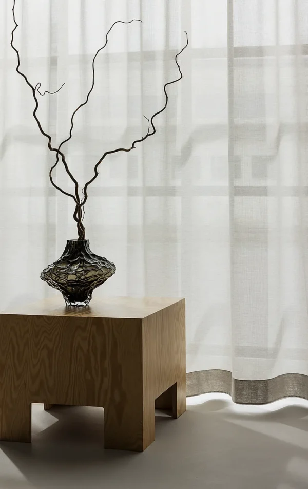 ZEN transparent hanging textile in layered neutral tones, softly filtering daylight.