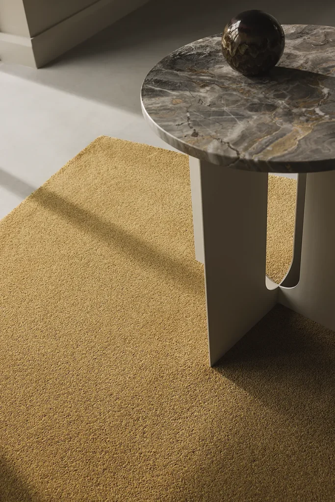 CANDY rug in a warm yellow two-tone melange in a contemporary interior.